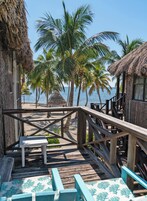 Habitación de lujo doble de uso individual, 2 habitaciones, vistas al mar, frente a la playa | Terraza o patio