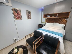 Llençols de cotó egipci, roba de llit d'alta qualitat i minibar 