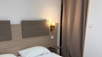 1 slaapkamer, een strijkplank/strijkijzer, wifi, beddengoed