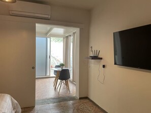 Appartamento Standard | 1 camera, copriletto in piuma, tende oscuranti, Wi-Fi gratuito