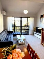 Family Apartment | Living area | Flat-screen TV