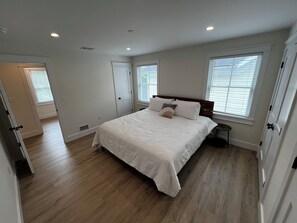 1 bedroom, desk, iron/ironing board, travel crib