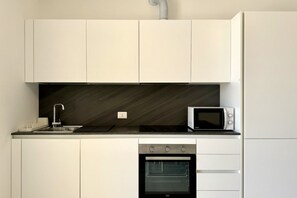 Microwave, dishwasher - Residence Wave Island 3 - Carraro Immobiliare Jesolo (Lido di Jesolo)