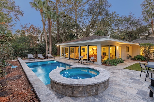 Discover the perfect beach getaway at 8 Juniper Lane in South Forest Beach, a beautifully designed new home with pool and spa, just steps from the ocean.
