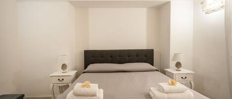2 dormitorios, tabla de planchar con plancha, wifi y ropa de cama