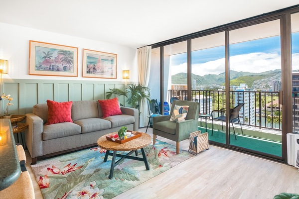Living room with pull-out sleeper sofa, accent chair, and coffee table.