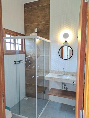 Separate bathtub and shower, deep-soaking bathtub, hair dryer, towels
