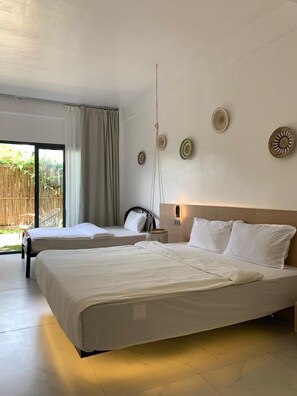 Deluxe Room, Multiple Beds, Garden View, Garden Area | Hypo-allergenic bedding, desk, soundproofing, free WiFi - Diving Addiction Resort (Panglao)