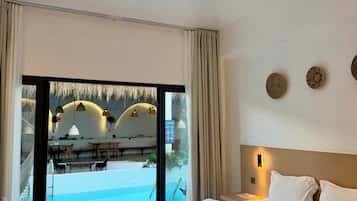 Deluxe Room, 1 King Bed, Pool Access, Pool View | Hypo-allergenic bedding, desk, soundproofing, free WiFi