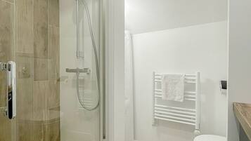 Shower, towels, soap, shampoo