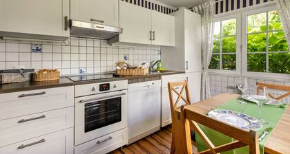 Ferienhaus 'Austernfischer Haus Sonnenschein' mit Gemeinschaftsterrasse, privatem Garten und WLAN