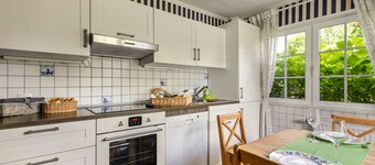 Holiday Home 'Austernfischer Haus Sonnenschein' with Shared Terrace, Private Garden and Wi-Fi