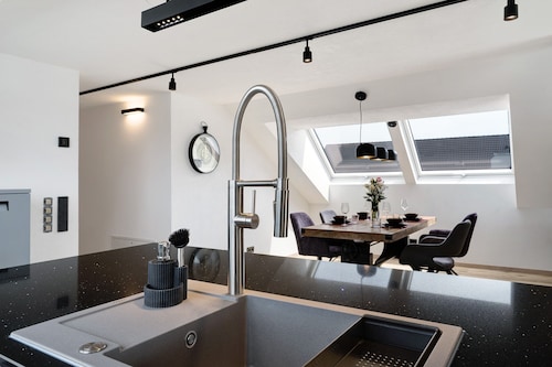 Apartment 'Moderne Offene Dachgeschoßwohnung' with Shared Pool, Shared Garden and Wi-Fi