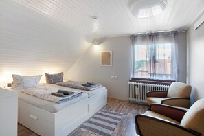 2 dormitorios, tabla de planchar con plancha, wifi gratis y ropa de cama