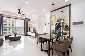 Luxury Apartment, 3 Bedrooms | Living area | Smart TV, Netflix, streaming services - KaLa RiverGate Apartment - Ben Thanh (Ho Chi Minh City)