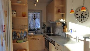 Apartment | Private kitchen | Oven, electric kettle, toaster
