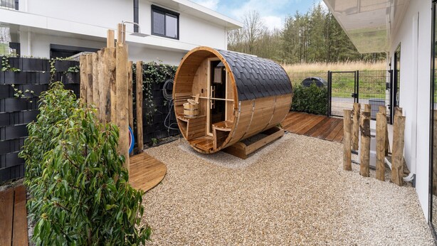 A modern house with a unique sauna built into a wooden barrel structure. - Villa in Zeewolde Near Town Center (Zeewolde)