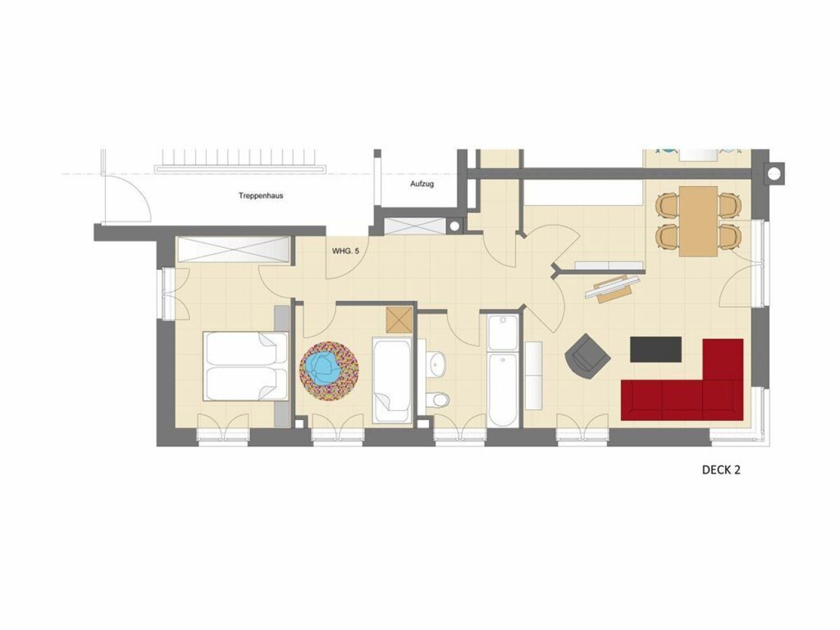 A floor plan of a hotel room with a living area, a dining area, a bathroom, and a small balcony.