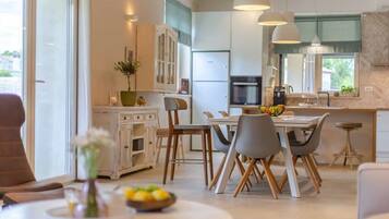 Villa | Private kitchen | Oven, electric kettle, toaster