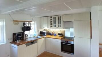 Apartment | Private kitchen | Oven, electric kettle, toaster