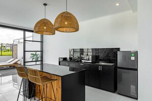 Fridge, microwave, stovetop, coffee/tea maker