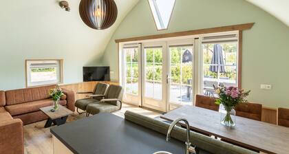 House With a Terrace on the Edge of the Forest