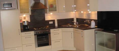 Appartement | Cuisine privée | Four, bouilloire électrique, grille-pain