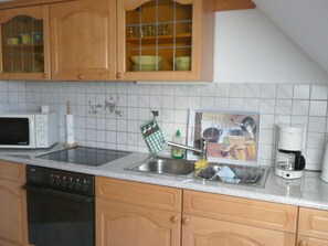 Maison | Cuisine privée | Four, bouilloire électrique, grille-pain