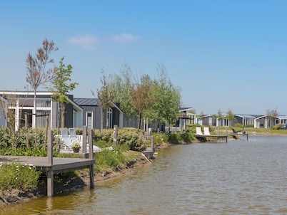 Chalet in Zeeland by Scenic Pond