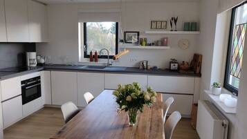 Apartment | Private kitchen | Oven, electric kettle, toaster