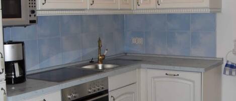 Apartment | Private kitchen | Oven, electric kettle, toaster