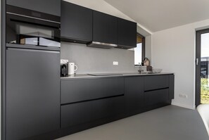 Fridge, oven, dishwasher, coffee/tea maker