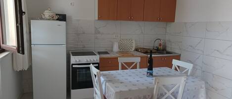 Apartment | Private kitchen | Fridge, microwave, oven, stovetop