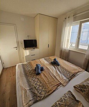 2 habitaciones, tabla de planchar con plancha y wifi gratis 