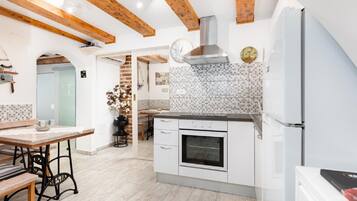 Apartment | Private kitchen | Electric kettle, toaster, high chair