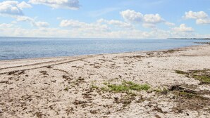 A beach with a clear sky and calm sea. - 5 Person Holiday Home in Sydals (Sydals)