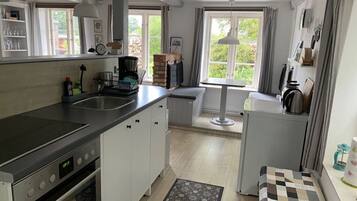 Apartment | Private kitchen | Oven, electric kettle, toaster