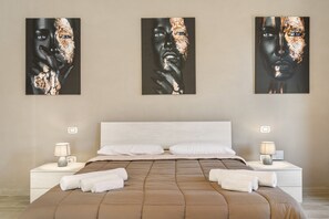 1 habitación, tabla de planchar con plancha, wifi gratis y ropa de cama 