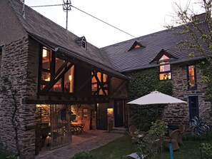 A stone building with a wooden balcony and a covered patio area. - Lovely Apartment in Kobern-gondorf (Kobern-Gondorf)