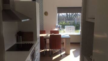 Apartment | Private kitchen | Oven, electric kettle, toaster