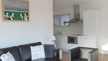 Apartment | Private kitchen | Oven, electric kettle, toaster