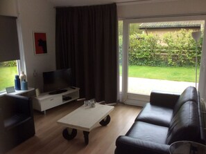 Living area - Holiday Home De Zilvermeeuw (Julianadorp)