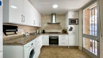 Villa | Private kitchen | Toaster, high chair