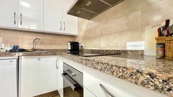 Villa | Private kitchen | Toaster, high chair