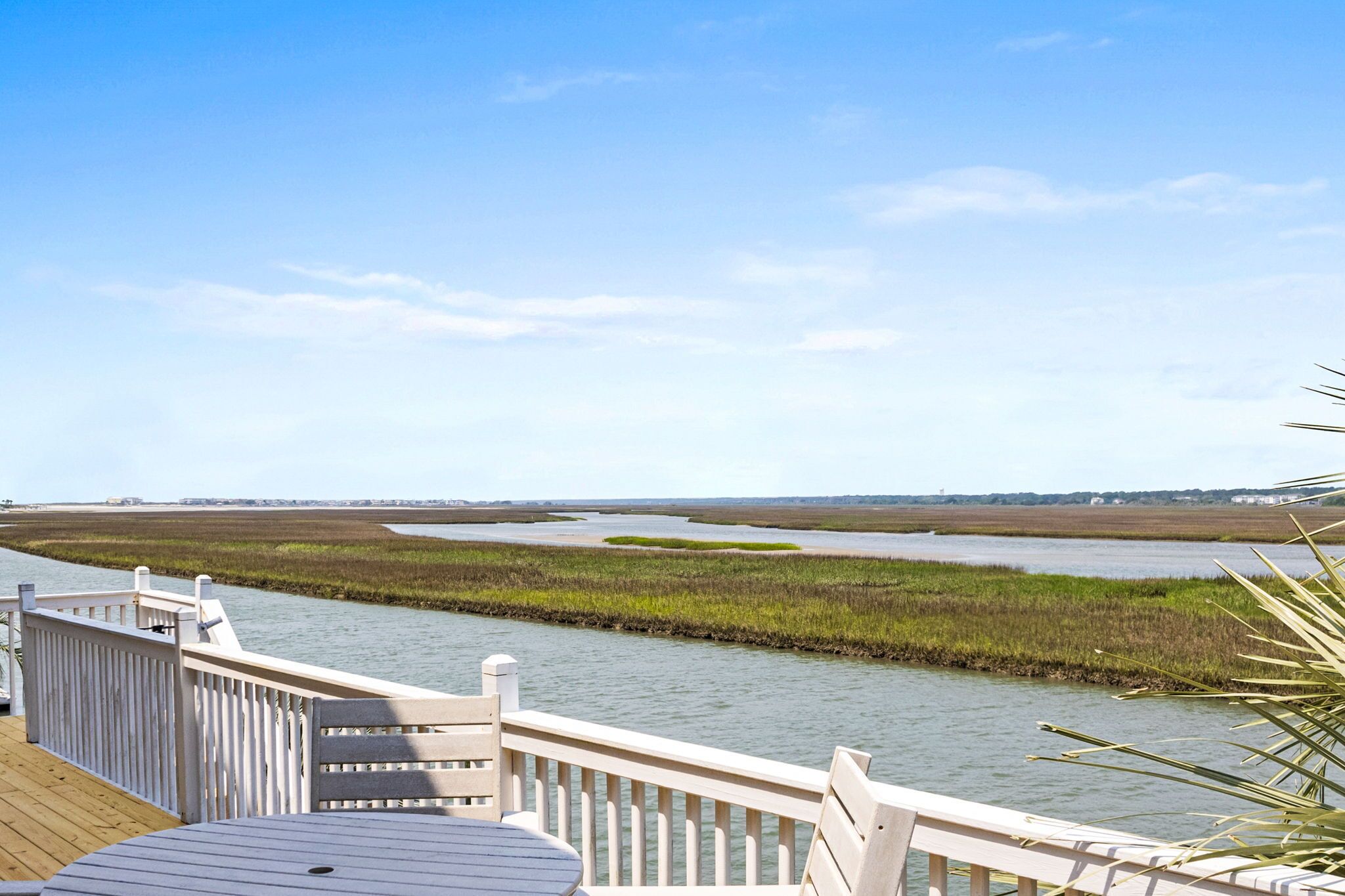 5br 3ba island home on creek- completely renovated May '24 -2 community pools-water views