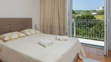 Apartment | 4 bedrooms, individually furnished, iron/ironing board