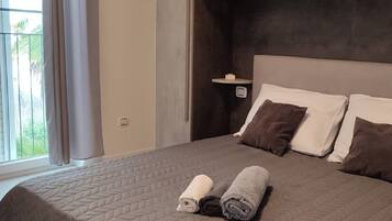 Appartement | 1 chambre, fer et planche Ă  repasser