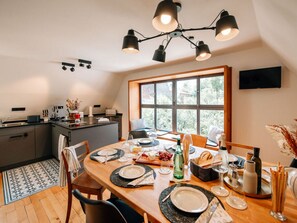 Casa | Cocina privada | Frigorífico, lavavajillas y trona infantil
