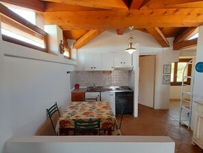 Apartment | Private kitchen - Belvilla by OYO Apartment in Golfo Aranci (Golfo Aranci)