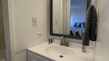 Hair dryer, towels, soap, shampoo